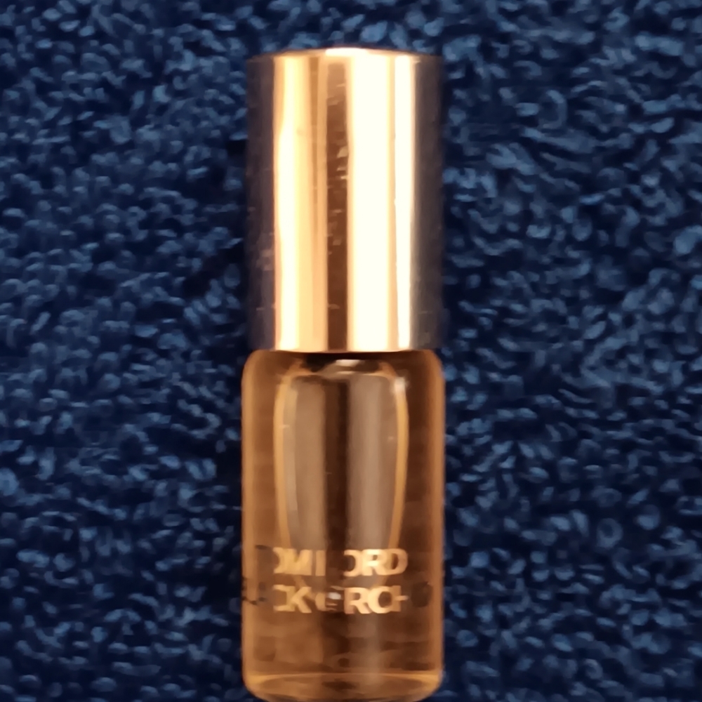 Genuine Tom Ford Black Orchid eau de parfum, Rollerball, .1fl oz. Used once.